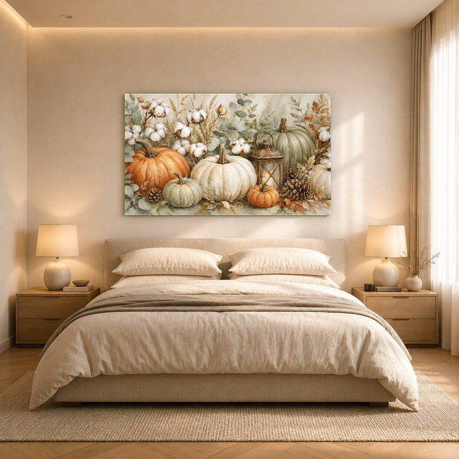 Vibrant orange pumpkin glass artwork displayed in a hotel lobby with warm fall-themed decor.