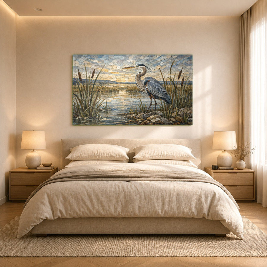 A cozy reading nook featuring the heron marsh glass print on a textured wall beside a modern leather armchair.