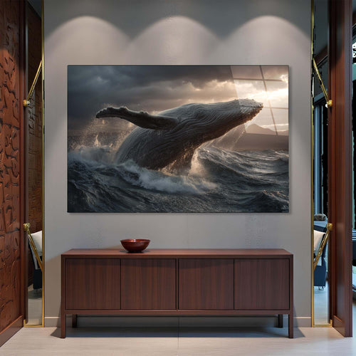 Whale breaching out of water with stormy sky and sunlit horizon