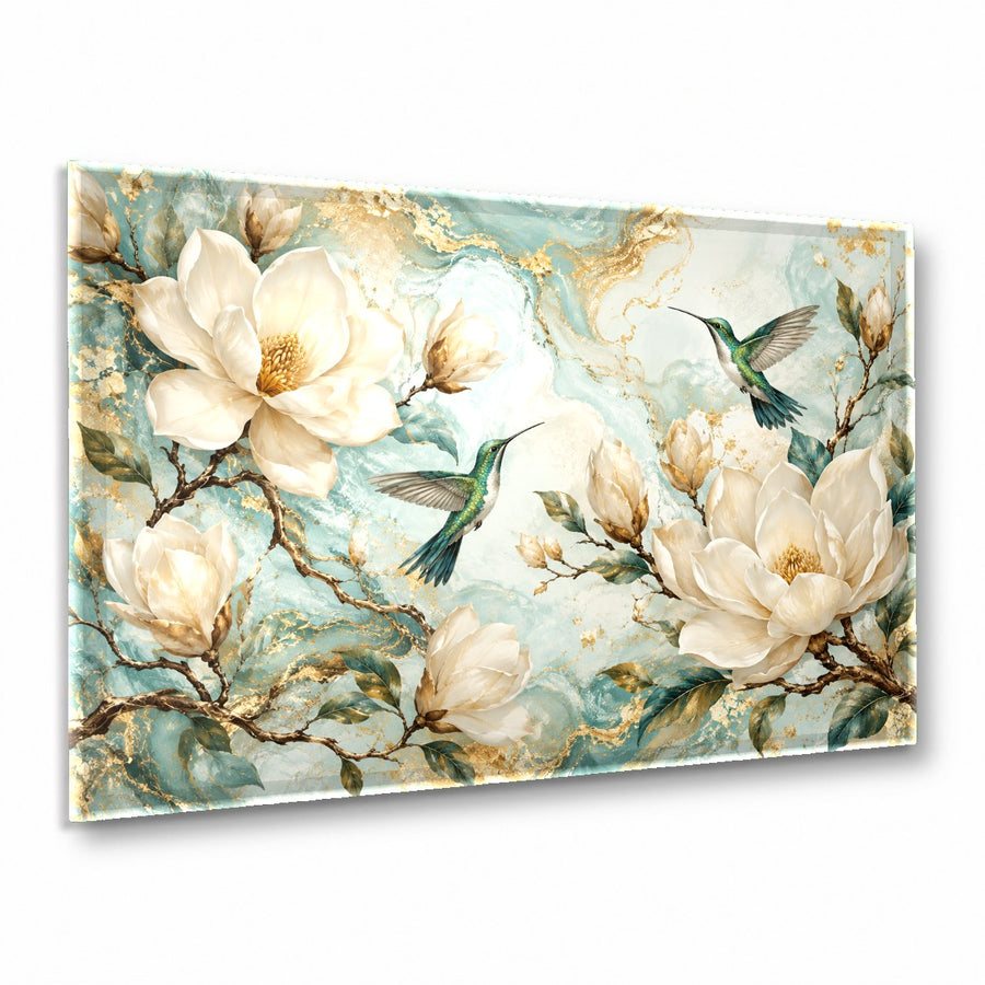 Vibrant hummingbird glass wall art hanging above a neutral sofa in a modern, sunlit living room.