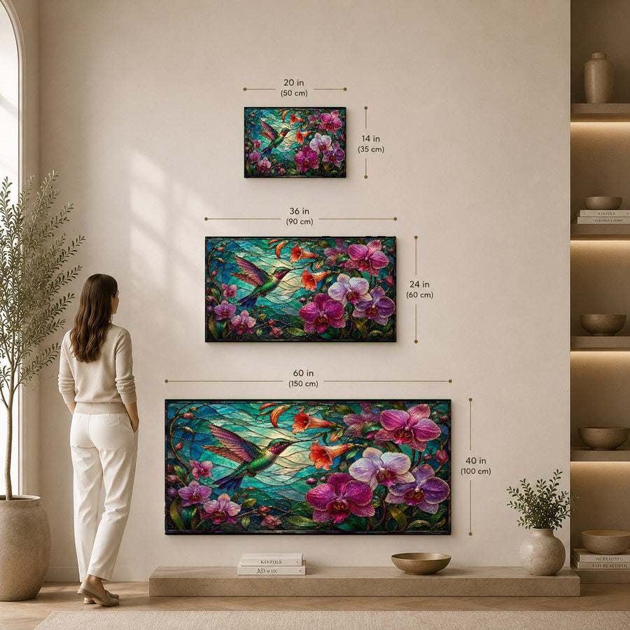 Sophisticated orchid and hummingbird glass wall decor styled in a minimalist hotel lobby with warm lighting.