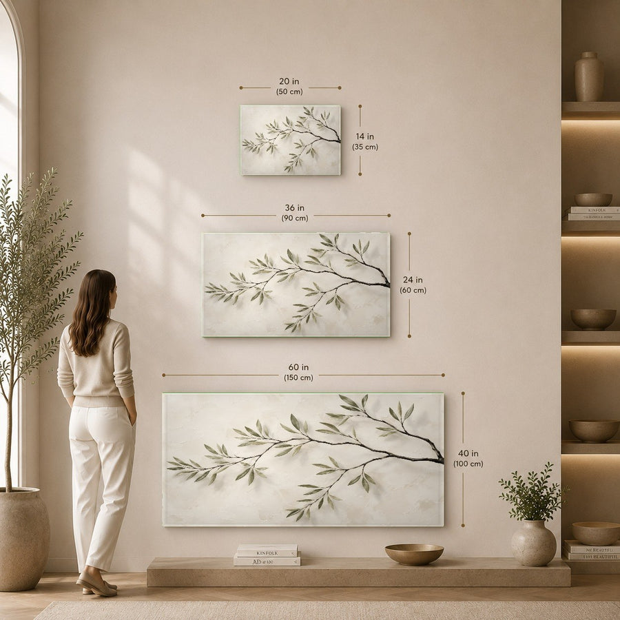 Green leaves tempered glass art piece displayed above a wooden sideboard in a contemporary dining room.