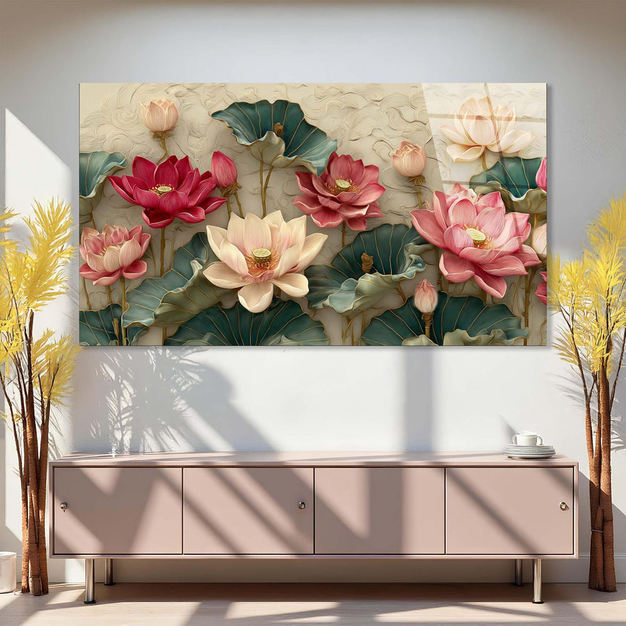 Decorative wall art of pink and green lotus flowers on a textured wall above a cabinet.