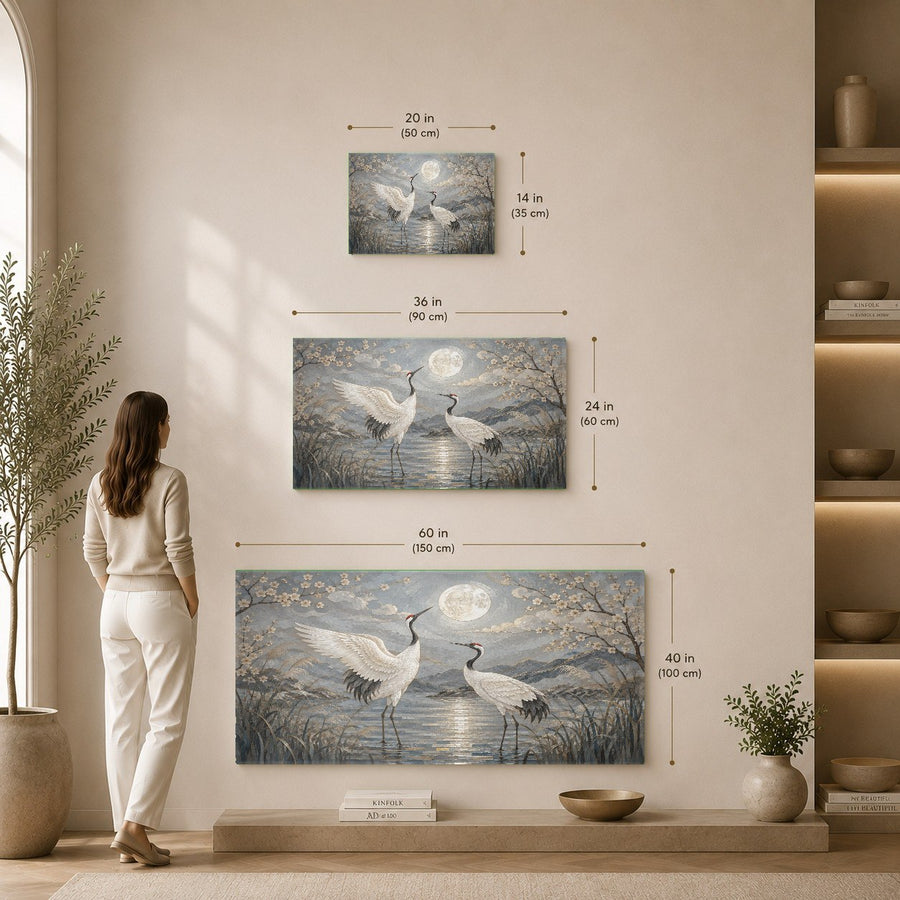 Moonlit Heron tempered glass print hanging in a minimalist dining room with coastal decor accents.