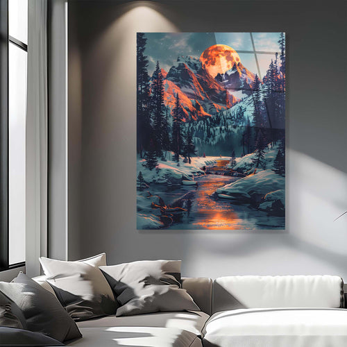 Framed artwork of a mountain landscape with a glowing moon.