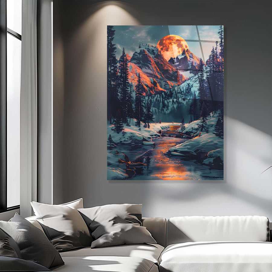Framed artwork of a mountain landscape with a river and people on a snowy day, hanging above a sofa in a living room.