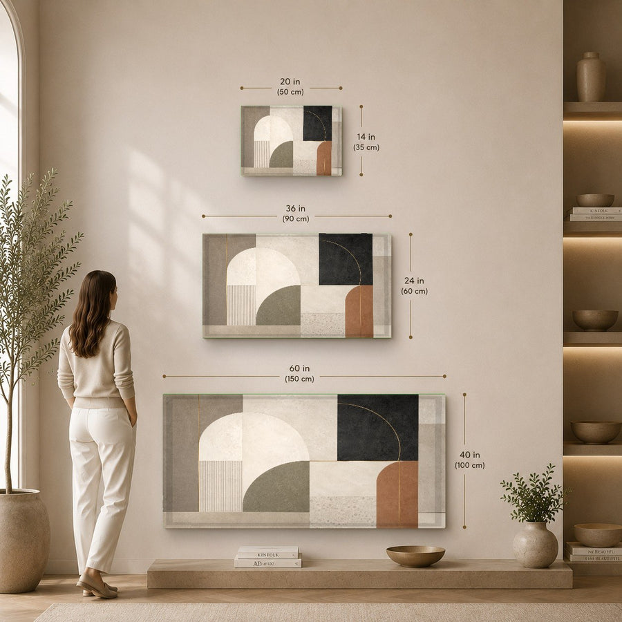 Chic entryway featuring a gold console table and a large-scale geometric glass print creating a bold first impression.