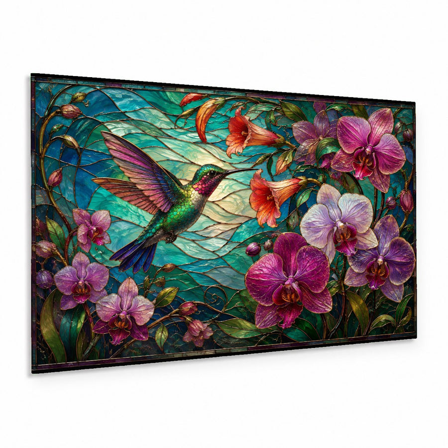 Orchid Hummingbird glass wall art hanging above a plush beige sofa in a brightly lit modern living room.