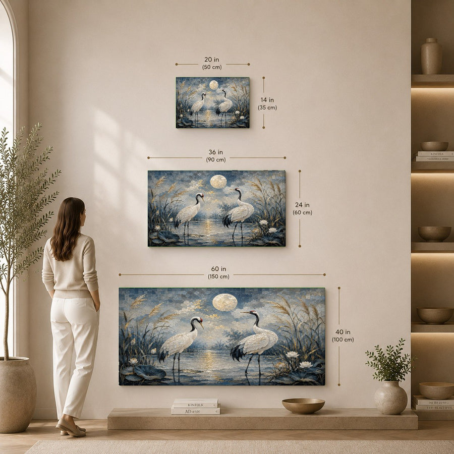 Side angle view of the frameless tempered glass art hanging in a contemporary hallway with warm spotlighting.