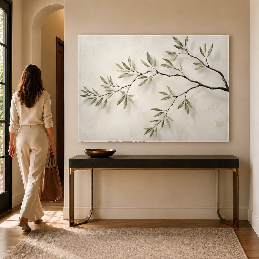 Botanical green foliage glass print mounted on a dark green accent wall in a minimalist master bedroom.