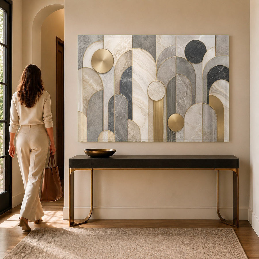 Close-up angle of a geometric marble print on tempered glass reflecting soft light in a luxury hotel lobby.