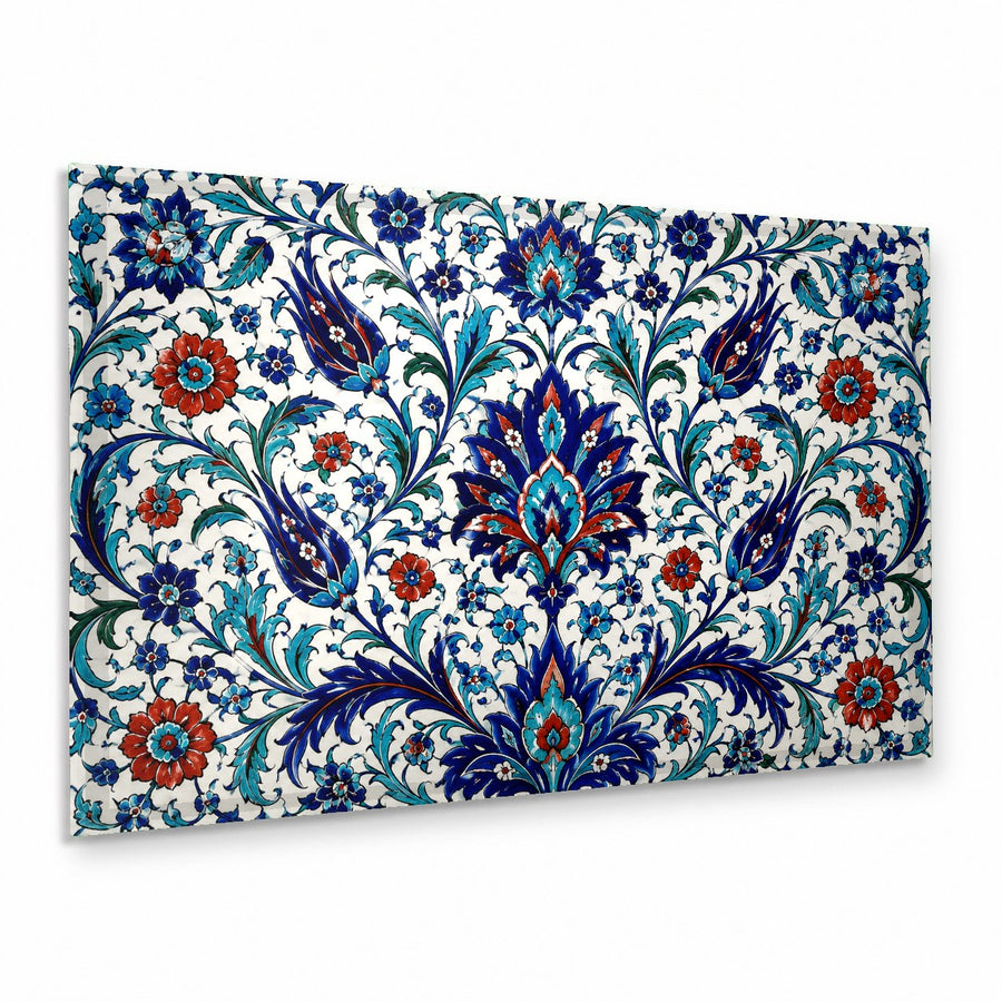 Iznik tile glass wall art hanging above a blue velvet sofa in a modern, sunlit living room.