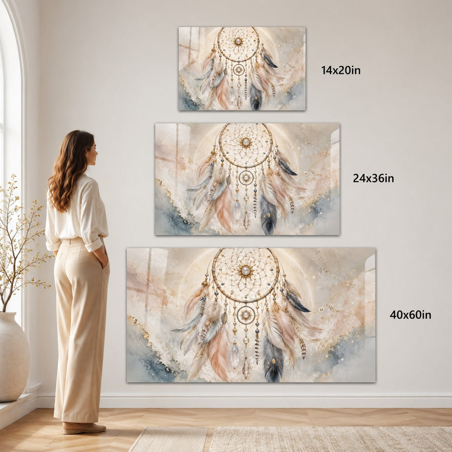 A woman stands in a bright room looking at a three-panel wall art set featuring dreamcatcher artwork. The panels are shown in three sizes with text labels: 14x20in, 24x36in, and 40x60in.
