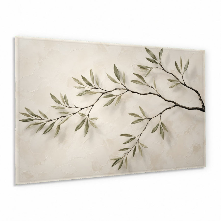 Green leaves tempered glass wall art hanging above a beige fabric sofa in a sunlit, modern living room.