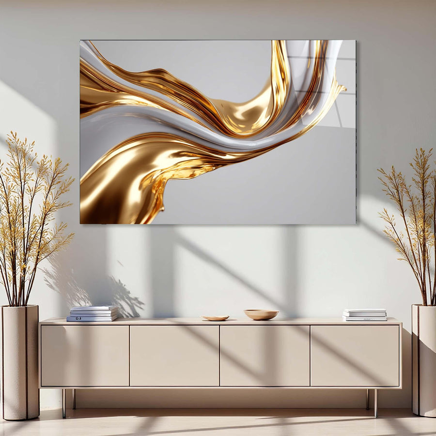 Abstract gold and white painting on a wall above a beige console table with decorative items.