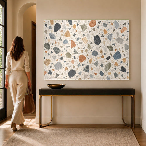 Terrazzo Mosaic glass wall art hanging in a modern living room above a beige minimalist sofa.