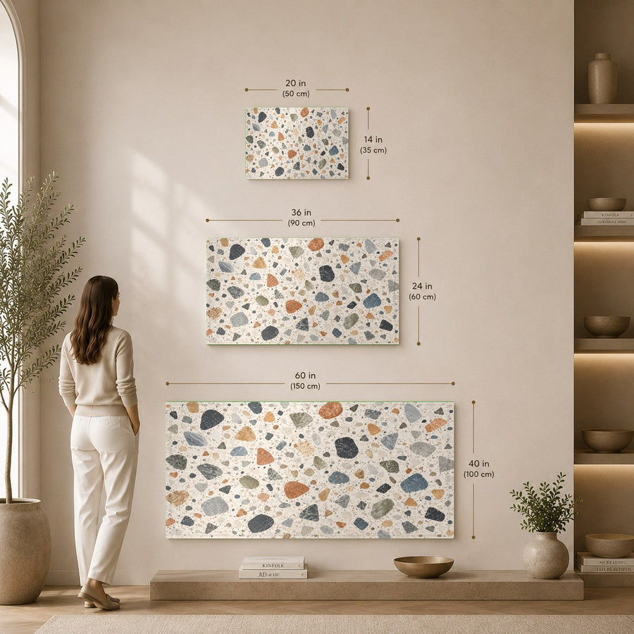 Angled view of a Terrazzo Mosaic glass print hanging in a luxury hotel suite living area.