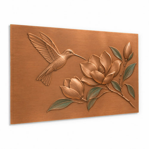 Magnolia Hummingbird Glass Wall Art hanging above a modern living room sofa