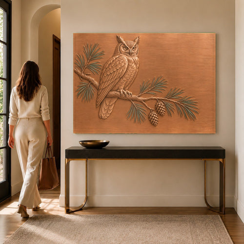 Pine Owl glass wall art hanging above a modern living room sofa
