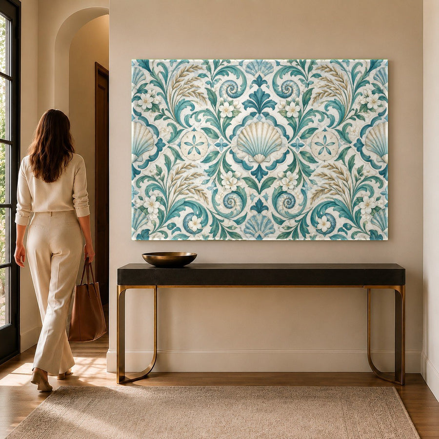Seashell Damask glass wall art hanging in a bright luxury beach house bedroom with soft ocean-blue bedding.