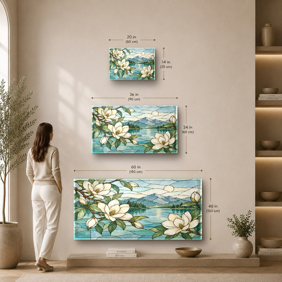 Large magnolia botanical glass art hanging on a neutral accent wall in a spacious hallway