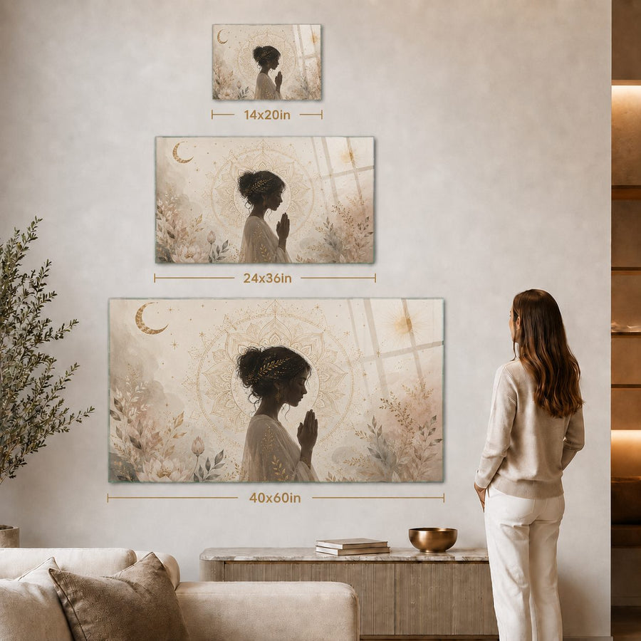 Three framed wall art prints showing a woman in profile with a crescent moon and soft floral background, displayed on a beige wall in a living room. Measurement lines indicate 14x20in, 24x36in, and 40x60in sizes.