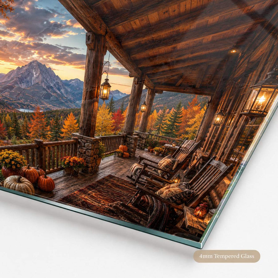 A framed or glass wall art print showing a rustic wooden porch overlooking a mountain landscape at sunset, photographed at an angle on a white background. A small label in the corner reads 4mm Tempered Glass.